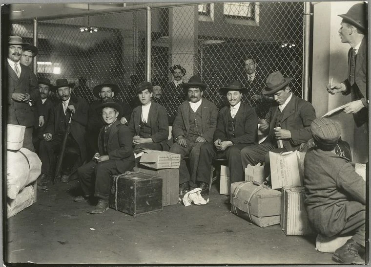 Lewis Hine’s 1908 photograph of immigrants waiting at Ellis Island